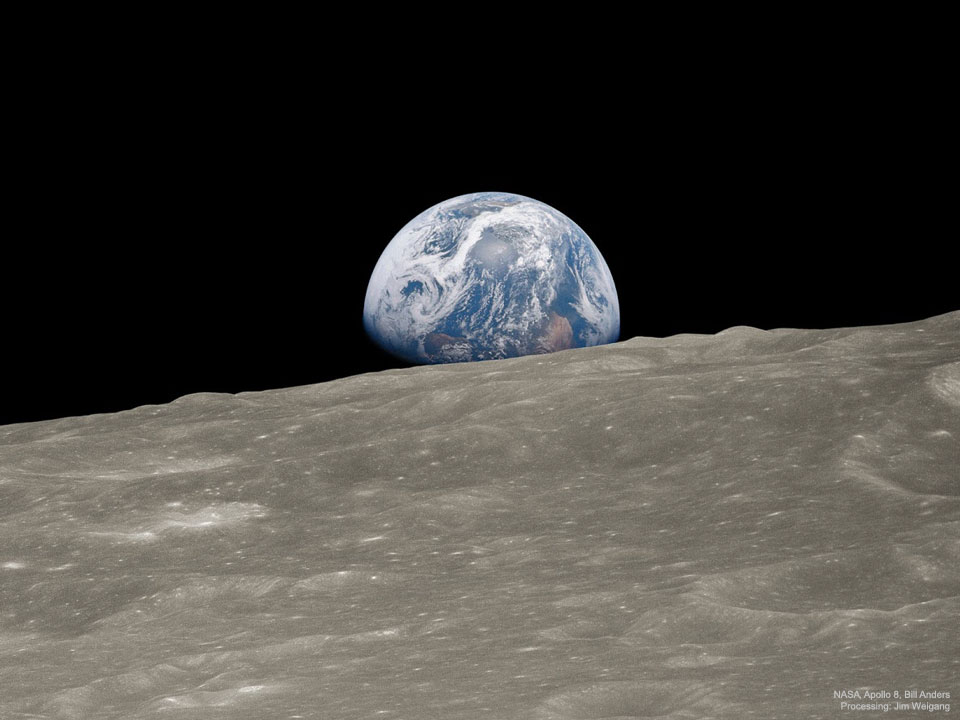 The featured image is a newly remasteed version of one of the most
famous pictures ever taken: the Earth rising behind the Moon from
Apollo 8. 
Please see the explanation for more detailed information.