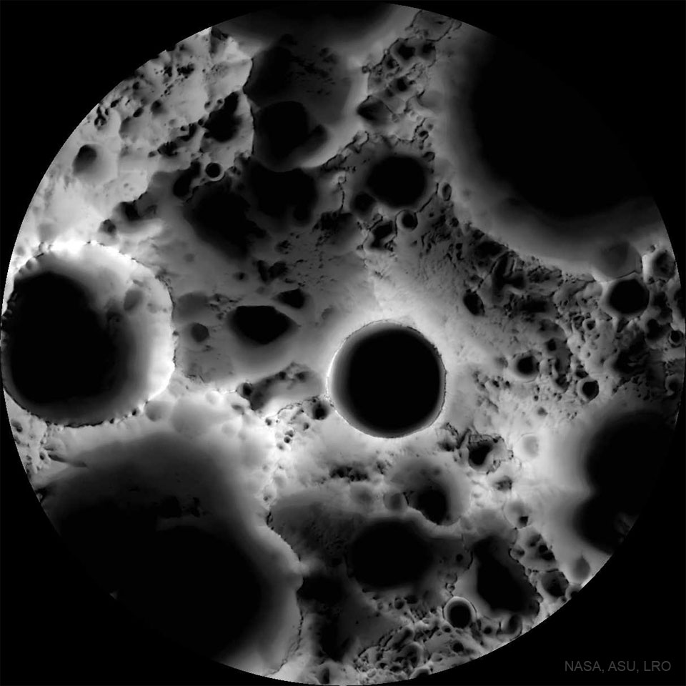 The featured image shows the permanently shadowed
region at the Moon's South Pole. The picture is a composite
of many lunar images taken from many illumination angles 
revealing which parts are never in direct sunlight.
Please see the explanation for more detailed information.