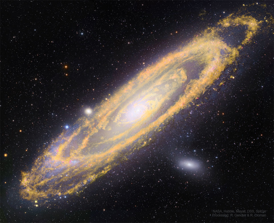 Zdjęcie pokazuje M13, Galaktykę Andromedy zarówno w podczerwieni
(zaznaczonej na pomarańczowo), jak i w świetle widzialnym (zaznaczonym
na niebiesko). Zobacz opis. Po kliknięciu obrazka załaduje się wersja o największej dostępnej
rozdzielczości.