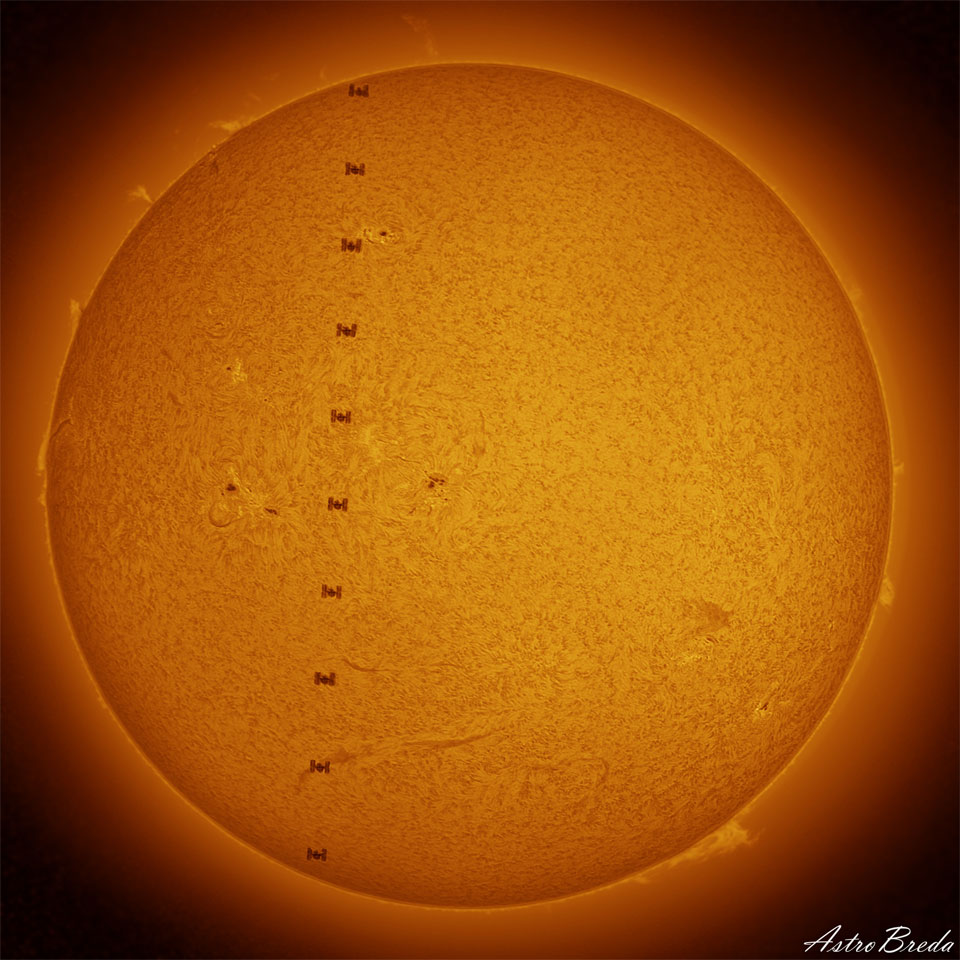 The Sun is pictured complete with active regions,
filaments, and prominences. Down the Sun's face is 
a series of silhouettes that are the International 
Space Station passing right in front. 
Więcej szczegółowych informacji w opisie poniżej.